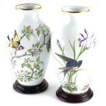 A pair of Franklin porcelain vases, each decorated with the Middleland bird pattern and the Woodland