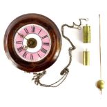 A late 19thC/early 20thC continental post mans alarm clock, the pink and white enamel dial with