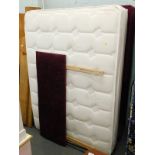 A double divan bed, with Soft Touch memory foam mattress.
