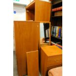 An Alston's Furniture bedroom suite, comprising wardrobe, compactum chest, and a pedestal cabinet,