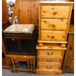 A pine part bedroom suite, comprising two pedestal three drawer cabinets, 62cm high, and a similar