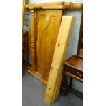 A late 20thC pine double bed frame, with arched head and foot board, 152cm wide, with slats.