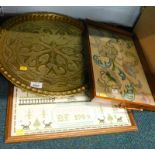 An embossed eastern brass dish, a sampler dated 1989 and an embroidered two handled galleried