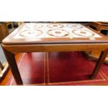 A vintage G-plan tile topped coffee table, with oblong top on chamfered legs, labelled, 41cm high,