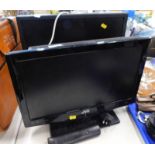 A small JVC LCD TV and a Dell monitor. (2)