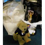 A modern wedding dress, a Golden Jubilee souvenir teddy bear, resin fairy figure, moulded glass
