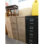 Four various four drawer metal filing cabinets, 133cm high, 38cm wide, 61cm deep, etc., a nest of