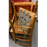 Two bedroom chairs, with caned seats.
