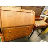 A teak bureau, and a single writing desk, with tooled leatherette top, on square tapering reeded