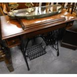 A treadle sewing machine on cast iron stand, and two part mirrors, (a quantity).