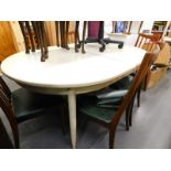 A vintage 1960s G Plan D end extending dining table, on turned legs later painted cream, 68cm