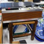 A Marconiphone, four track tape player, an oak stool, and various tapes.