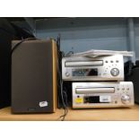 A Denon high-fi with cassette deck, DRR-M330 and CD receiver UD-M30, and a pair of speakers.