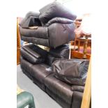 A two piece electric reclining lounge suite, comprising three and two seater settees' in dark