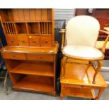 A mahogany finish open cabinet of rectangular form, with fixed moulded top, open shelves, and four