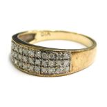 A 9ct gold diamond set dress ring, with three rows of tiny diamonds, approximately 0.25ct overall, r