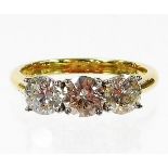 An 18ct gold diamond three stone ring, with three round brilliant cut diamonds, approx 5.2mm x 5.2mm