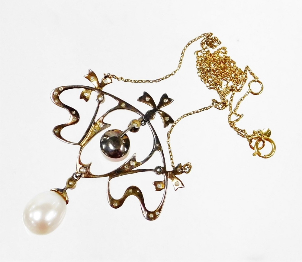 An ornate diamond and pearl necklace, in Belle Epoque style with bows and sprays, set with tiny diam - Image 3 of 3