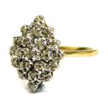 A 9ct gold dress ring, with central cluster set with tiny diamonds, each in illusion setting of thre