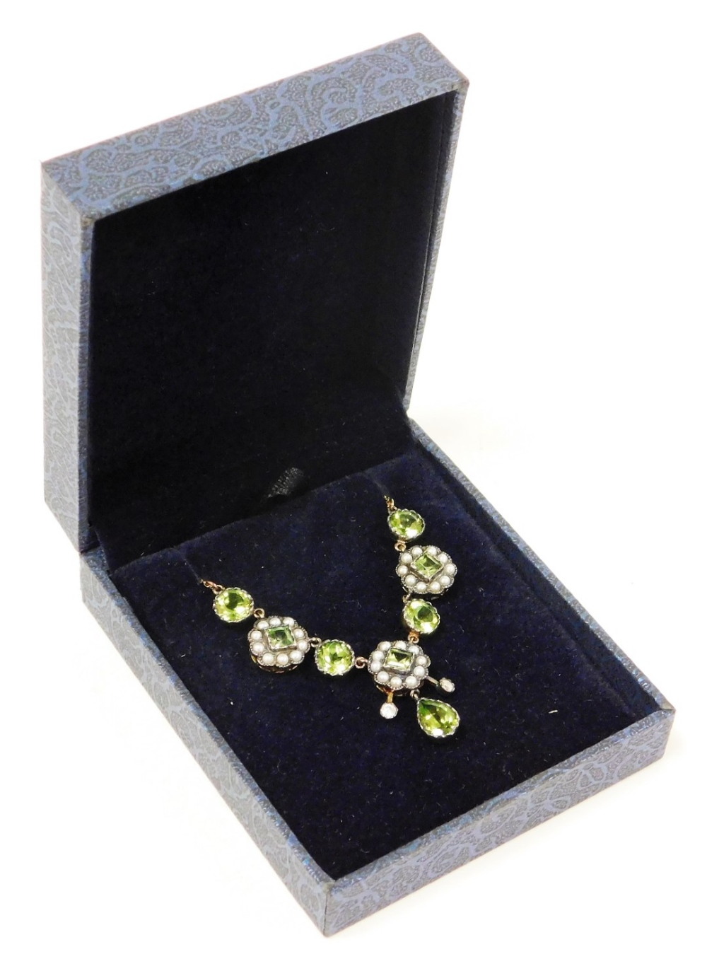 A diamond, seed pearl and peridot cluster necklace, the pendant section set with three clusters set