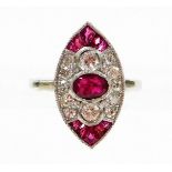 A ruby and diamond marquise shaped panel ring, oval cut ruby in rub over setting, with two round bri