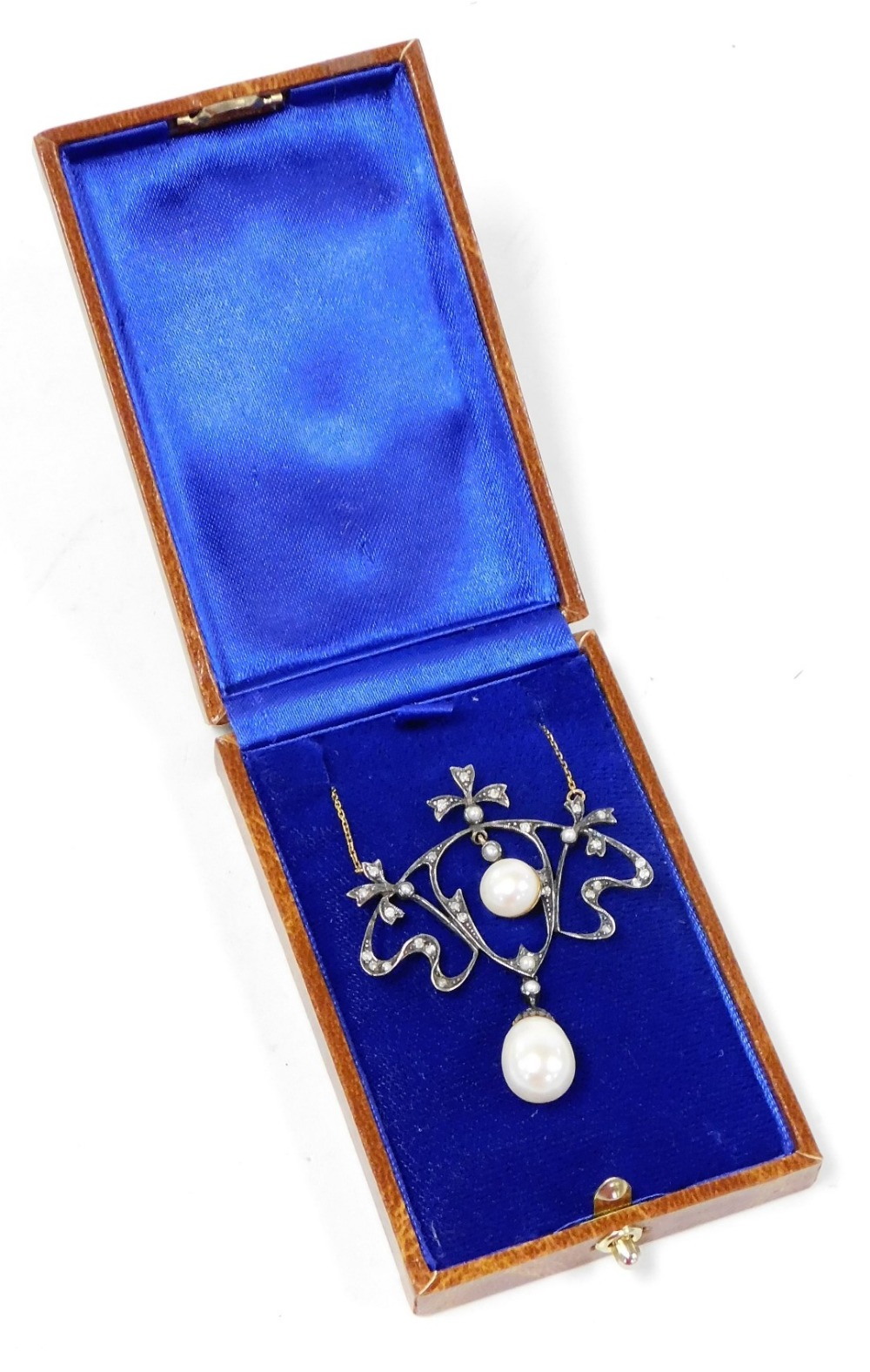 An ornate diamond and pearl necklace, in Belle Epoque style with bows and sprays, set with tiny diam