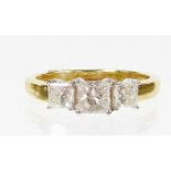 An 18ct gold diamond trilogy ring, with three princess cut diamonds, the centre stone 4.2mm x 4mm x