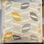 A Zipcode Design Matthias cotton cushion in beige, grey and yellow pattern, RRP £10.99.