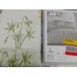 A Fusion Golden Plain giraffe double duvet cover set, RRP £18.99, and a Dreams and Drapes