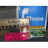 A tin telephone sign, and further signs for Track-A-Lign, Action Color Surface by McBroom Const.