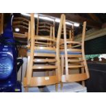 A set of four beech 1950's style kitchen chairs, with brown mottled fabric seats.