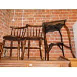 A pair of IBEX style penny seat kitchen chairs, together with a mahogany occasional table. (3)