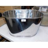 A Bollinger stainless steel champagne bucket.