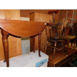 An Edwardian mahogany drop leaf table, 72cm high, 74cm wide, 91cm deep., together with an