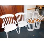 A set of six painted beech lath back kitchen chairs, including two carvers.