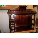 A Victorian mahogany dresser back, later converted into a bookcase, 129cm high, 146cm wide, 26cm