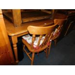 A beech kitchen table, with turned legs, 75cm high, 122cm wide, 77cm deep., together with four beech