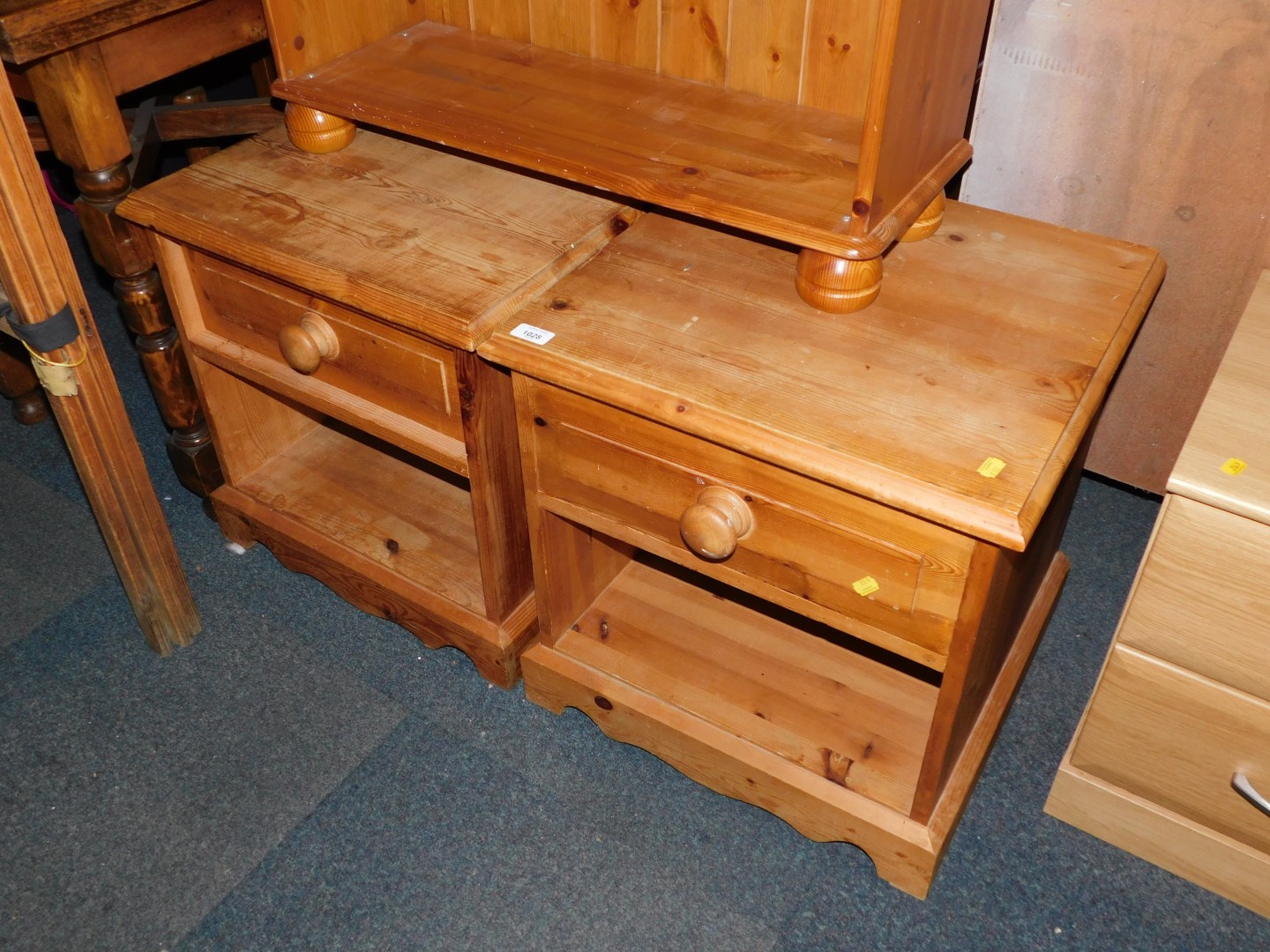 A pair of waxed pine bedside cabinets, 53cm high, 51cm wide, 48cm deep.