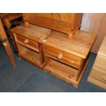 A pair of waxed pine bedside cabinets, 53cm high, 51cm wide, 48cm deep.