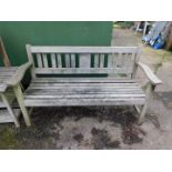 A teak slatted garden bench.