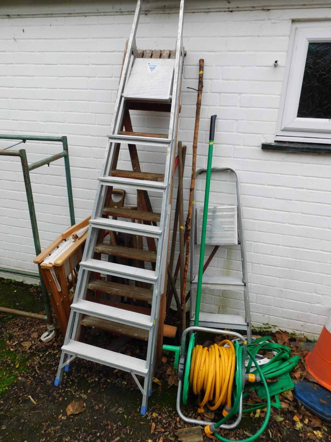 Withdrawn Pre-Sale by Executors. Three step ladders, various garden hand tools, director's chair,