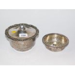 A silver plated sponge dish with drainer and lid, together with a plated soap dish. (2)