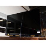A Panasonic 32" flat screen colour television, model TX-32A400B, with remote.