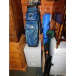 A steel filing cabinet, golf clubs, three camping seats and a workmate. (6)