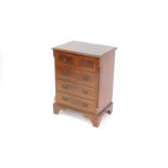 Withdrawn Pre-Sale by Executors. A reproduction yew wood chest of two over three drawers,