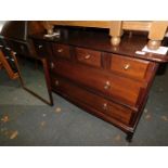 A Stag Minstrel dressing chest, with rectangular mirror, over four small and two long drawers, 120cm
