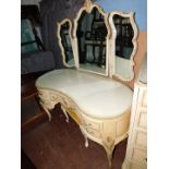 A French style cream painted dressing table, with tryptic mirror, 151cm high, 127cm wide, 60cm