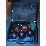 A set of eight Taylor's bowls, with carry bag.