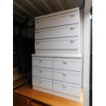 A white melamine chest of three drawers, 71cm high, 79cm wide, 46cm deep., together with a pair of