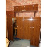 A Schreiber hi-gloss walnut bedroom suite, comprising a three door wardrobe, 171cm high, 120cm wide,
